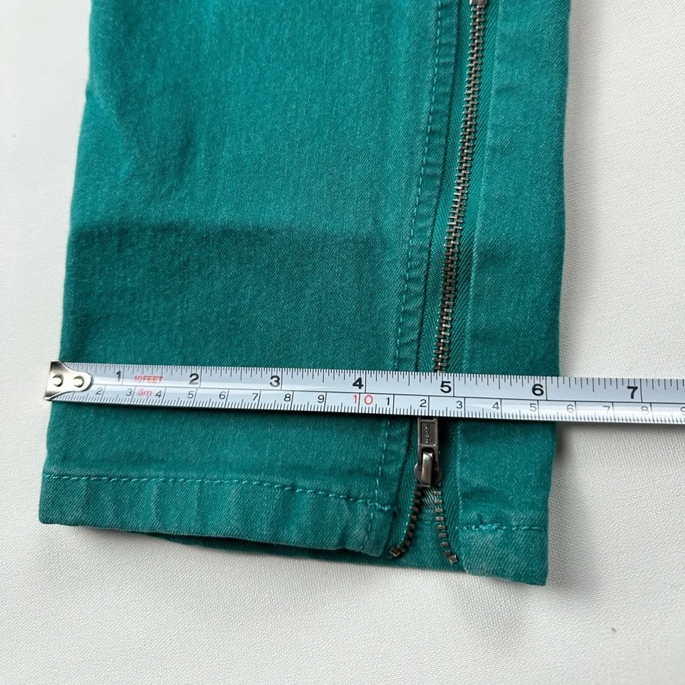 JLo straight jeans. Stretchy. Teal with zipper at ankle. Size 12